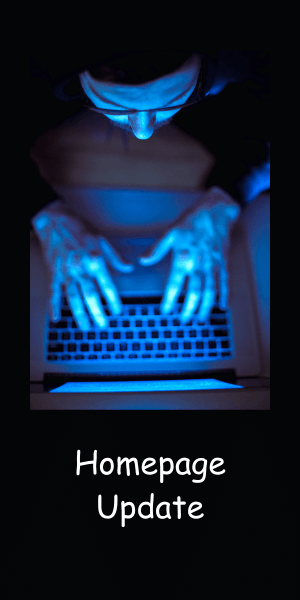 man on computer in the dark, enjoying browser